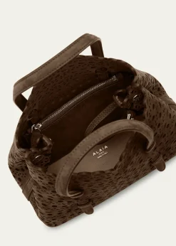 ALAIAMina 20 Top-Handle Bag in Perforated Suede